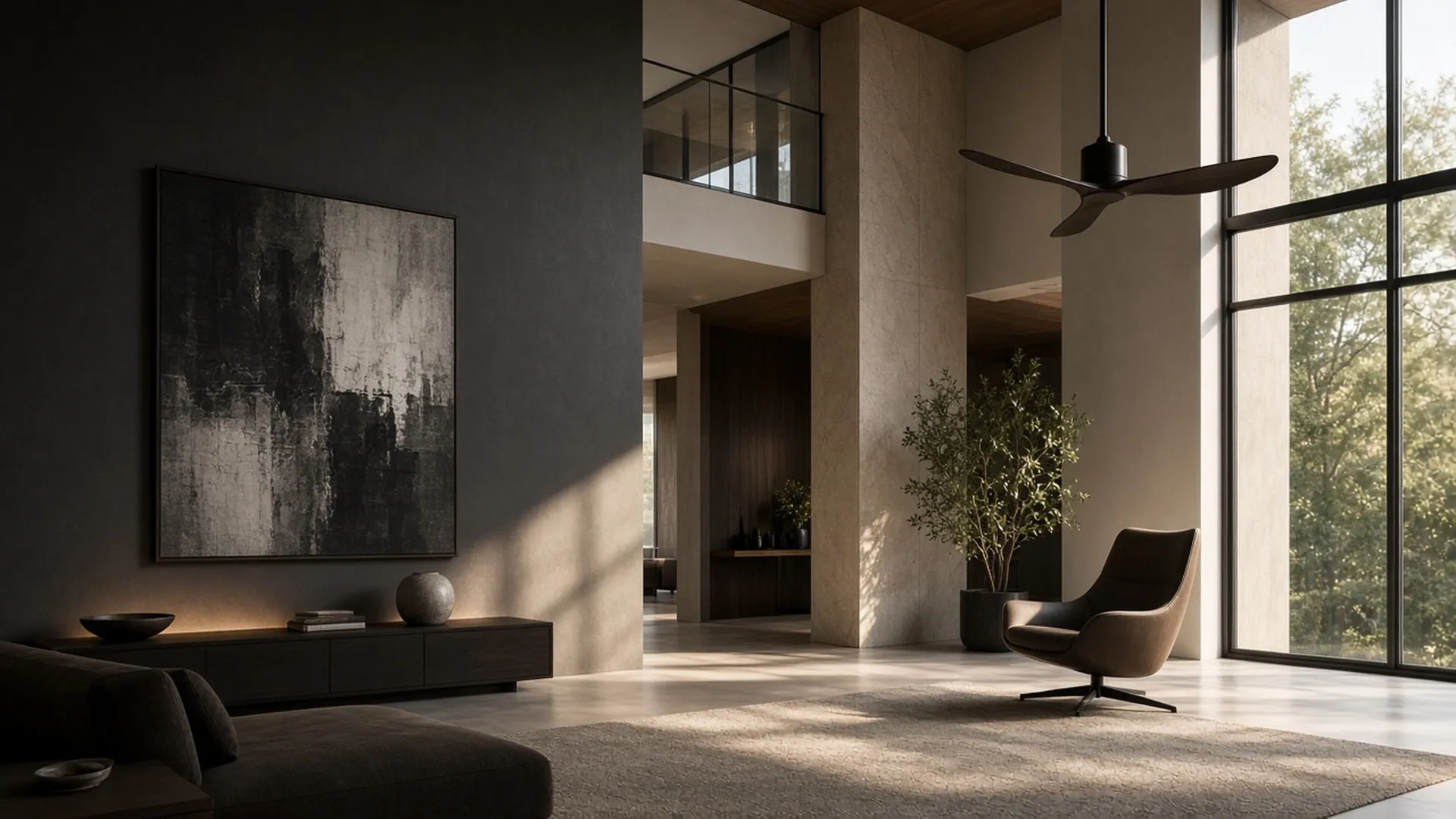 A double-height living room with a ceiling fan hanging on a long slender downrod