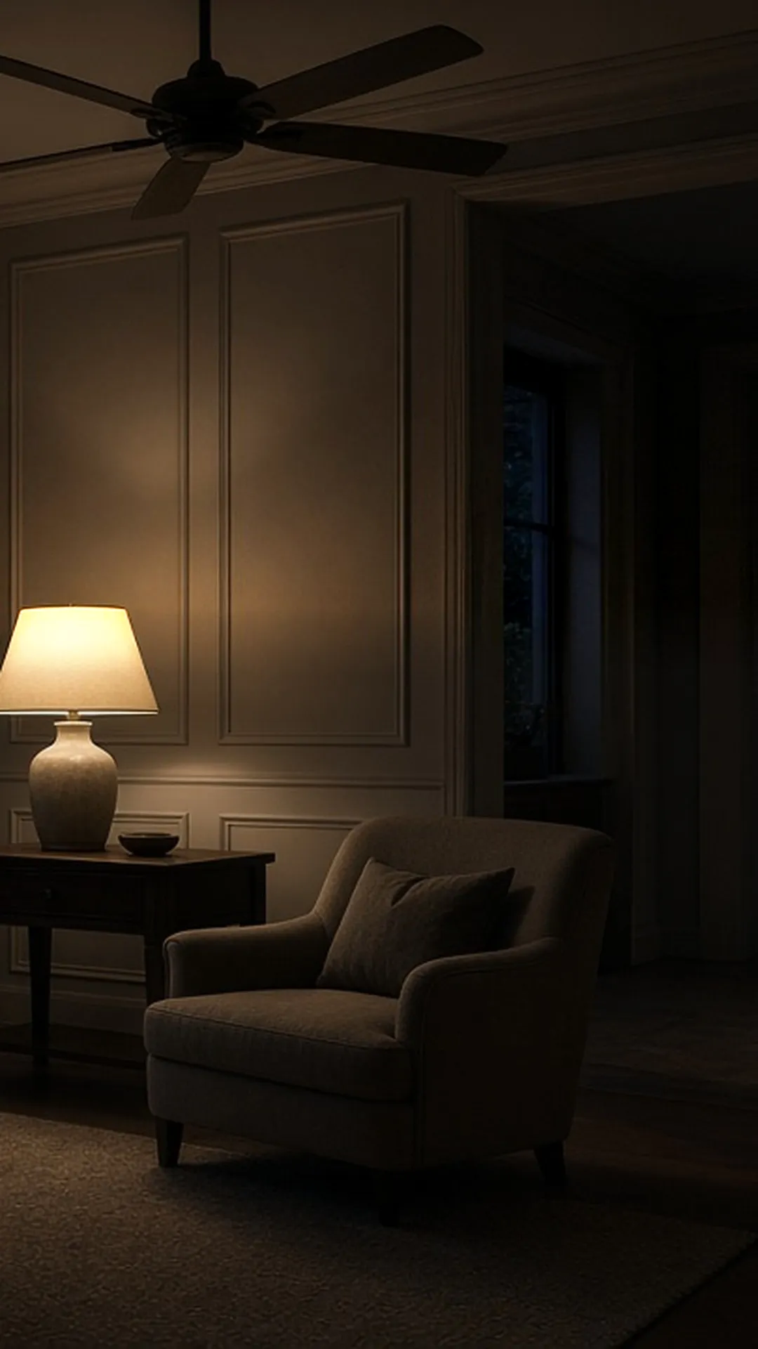 A ceiling fan light kit switched off in a quiet room at dusk